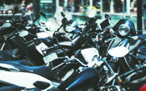 Plenty Of Motorcycles Parked Outdoors